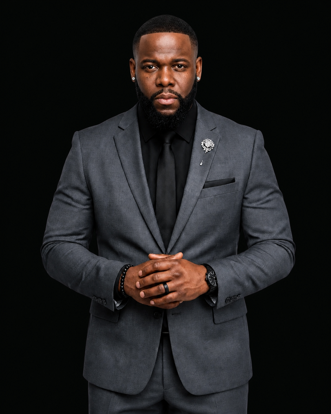 Donnie Burton in a tailored gray suit